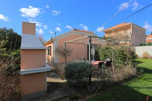 Family friendly house with a parking space Trogir - 19247