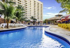 Flat Golden Dolphin Grand Hotel - Quarto e Sala Com Roupa de Cama e Banho - Piscinas 24h