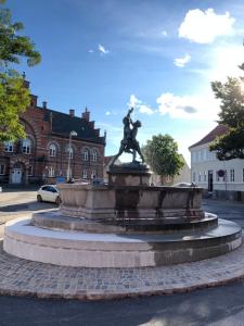 Huset ved springvandet