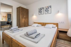 Apartments with parking space Vir - 19332