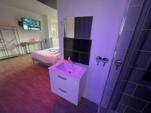 Appartements Ngsuitehome Winoc 34 : photos des chambres