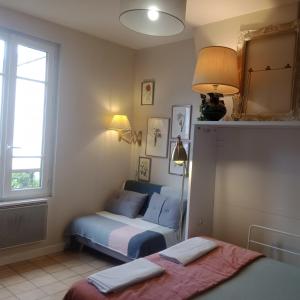 Appartements PARIS AUTHENTIC HOUSE Small, bright and calm studio : photos des chambres