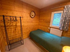 Knus boshuisje middenin de natuur