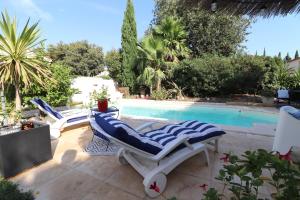 Villas Villa haut de gamme climatisee 3 ch piscine privee a 15mn de la mer : photos des chambres