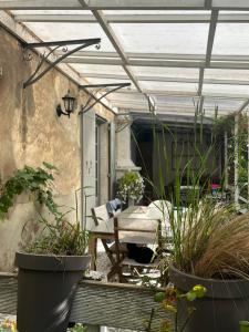 Sejours chez l'habitant Chambre paisible dans une ancienne batisse renovee : photos des chambres