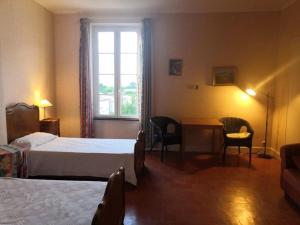 B&B / Chambres d'hotes Les Volets Bleus : photos des chambres