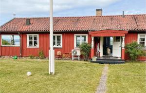 Amazing home in Rttvik with Outdoor swimming pool, WiFi and 4 Bedrooms