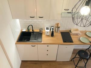 Appartements Studio climatise - Gare - Centre ville : photos des chambres