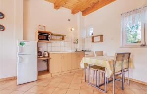 Cozy Apartment In Rowy With Kitchen