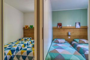 Appartements Mobil-home tout confort : photos des chambres