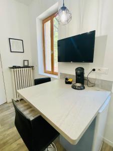 Appartements Studio neuf bien place, jardin et parking gratuit : photos des chambres