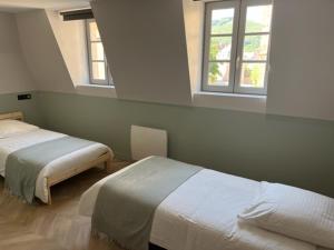 Maisons de vacances LE CHAPITRE - Agreable maison de ville : photos des chambres