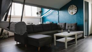 Appartements Appart climatise style loft avec garage : photos des chambres