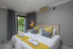 San Lameer Villa 14109 - 4 Bedroom Deluxe - 8 pax - San Lameer Rental Agency