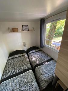 Campings MOBIL HOME Climatise G058 : photos des chambres