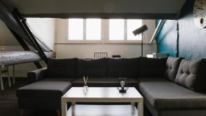 Appartements Appart climatise style loft avec garage : photos des chambres