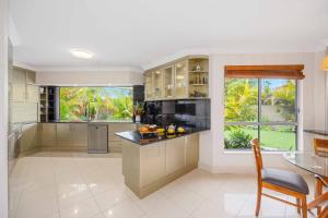 Riverside Breeze - luxury family retreat with pool