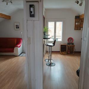 Appartements Sous Les TOITS ARVERNE : photos des chambres