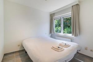 Ruim appartement 1min van strand met privé parking