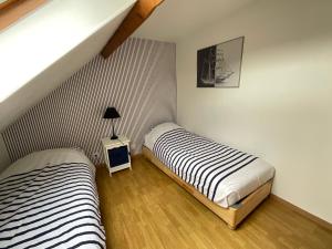 Maisons de vacances le Cottage de la Plage - Maison avec garage : photos des chambres