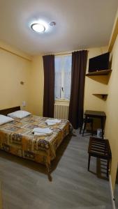 Hotels Hotel le Commerce : photos des chambres