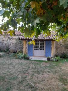 Maisons de vacances La petite maison bleue avec piscine : photos des chambres