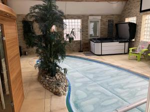 Villas Villa de 4 chambres avec piscine privee sauna et jardin clos a Villemeux sur Eure : photos des chambres