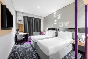Urban Twin Room - with complimentary Shuttle Service to the Beach and Deira City Center room in Studio M Arabian Plaza Hotel & Hotel Apartments by Millennium