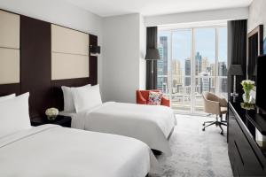 Superior Twin Room - Includes daily access to Riva Beach Club with free shuttle service room in Mövenpick Hotel Jumeirah Lakes Towers Dubai