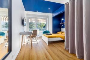 Appartements Appart'Hotel Le Grand Bleu - 5 Chambres - Evry : photos des chambres