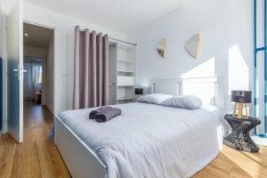 Appartements Appart'Hotel Le Grand Bleu - 5 Chambres - Evry : photos des chambres