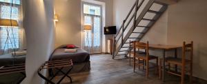 Appartements STUDIOS PARISIENS : photos des chambres