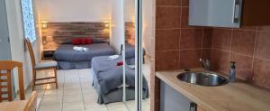 Appartements STUDIOS PARISIENS : photos des chambres