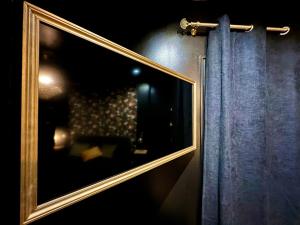 B&B / Chambres d'hotes Love Room Secrete Les Petits Plaisirs : photos des chambres