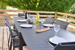 Maisons de vacances L'Arbre Vert - Piscine - Jardin - Arrivee Autonome : photos des chambres