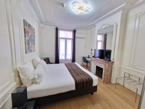 Hotels Hotel Oceanic - Grands Magasins : photos des chambres
