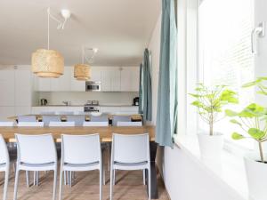 Spacious holiday home in Nes with garden