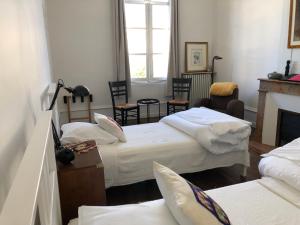 B&B / Chambres d'hotes Beautifully renovated rooms on Place New York : photos des chambres