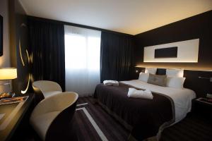 Hotels LE COLISEE Hotel & Spa NANTES Saint Herblain : photos des chambres