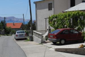 Apartments with a parking space Senj - 7475