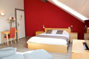 Quadruple Room room in Hôtel du Marché