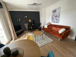 Appartements 2 p. parking gratuit 8 mn a pied du centre ville : photos des chambres