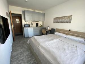 Studio 20qm mit Balkon und Innenpool - 22031