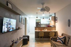 Apê aconchegante condomínio beira lagoa cpiscina