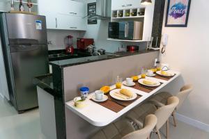 Apê aconchegante condomínio beira lagoa cpiscina