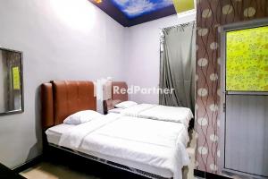 MT Syariah Homestay Kerinci RedPartner