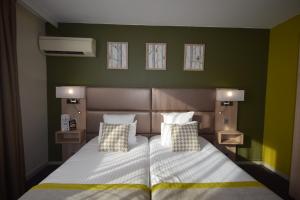 Hotels Kyriad Prestige Bordeaux Aeroport : Chambre Lits Jumeaux