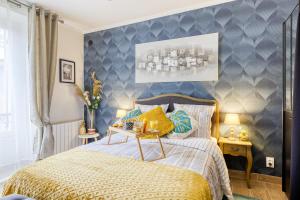 Appartements Fleur de lys 5 min Chateau et Gare Wifi, Netflix : photos des chambres