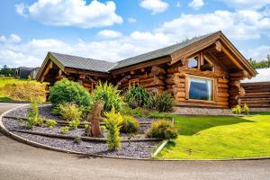 The Log Cabins at The Vu