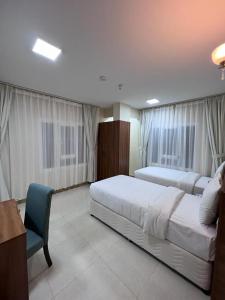 Grand Orchid Hotel Apartment
